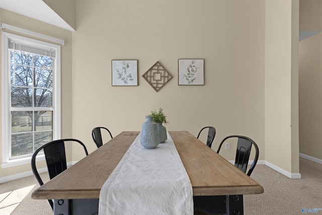view of carpeted dining room