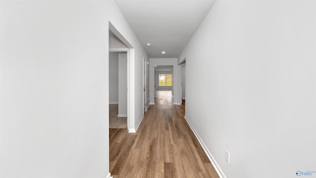 hall with light wood-type flooring