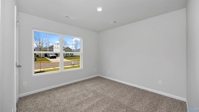 view of carpeted spare room