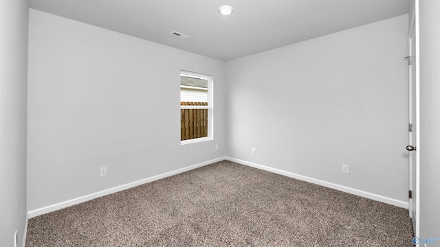 unfurnished room with carpet