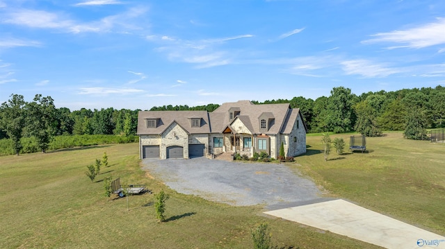 view of front facade featuring a front lawn and a garage