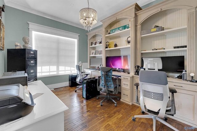 home office with a notable chandelier, wood-type flooring, and built in desk