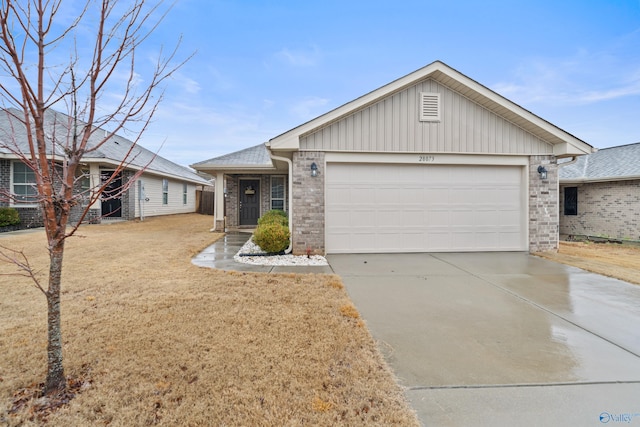 single story home featuring a garage