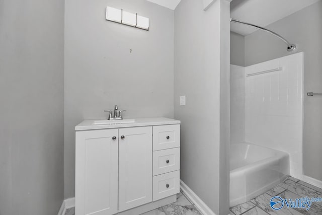 bathroom featuring vanity and tub / shower combination