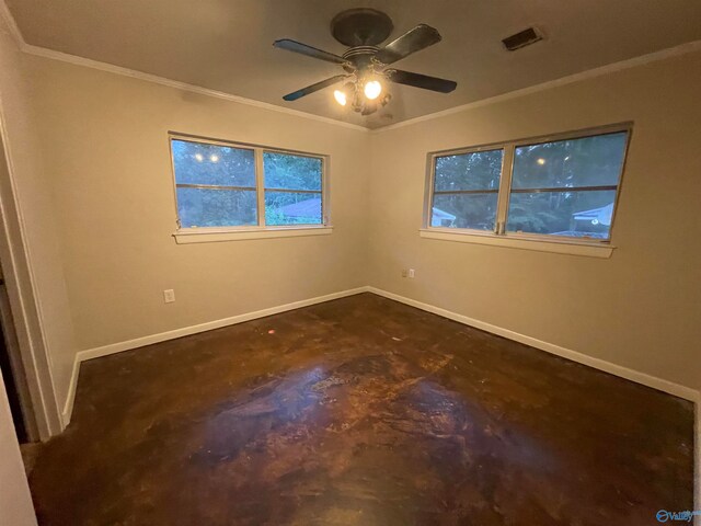 spare room with ceiling fan and ornamental molding