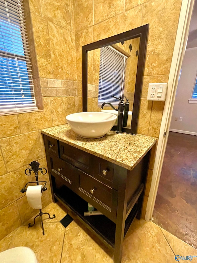 bathroom with vanity and tile patterned floors