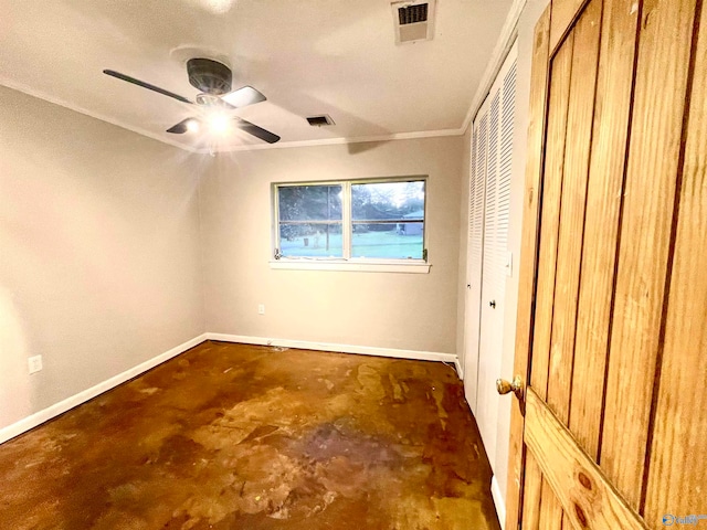 spare room with crown molding and ceiling fan