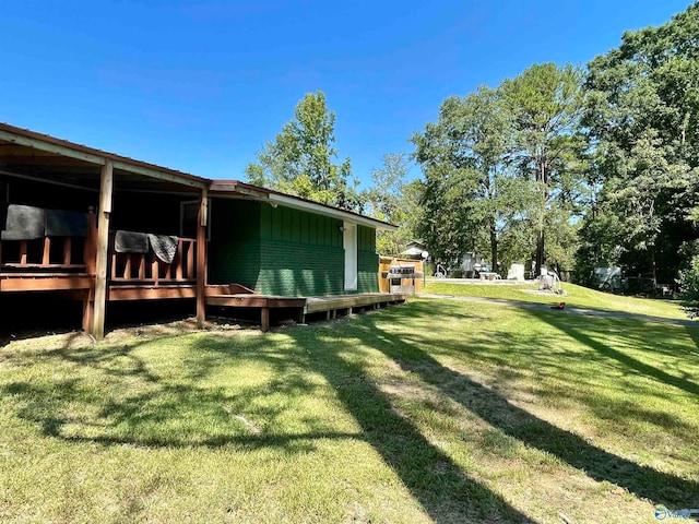 view of yard featuring a deck