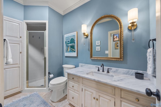 bathroom featuring crown molding, vanity, toilet, and a shower with shower door