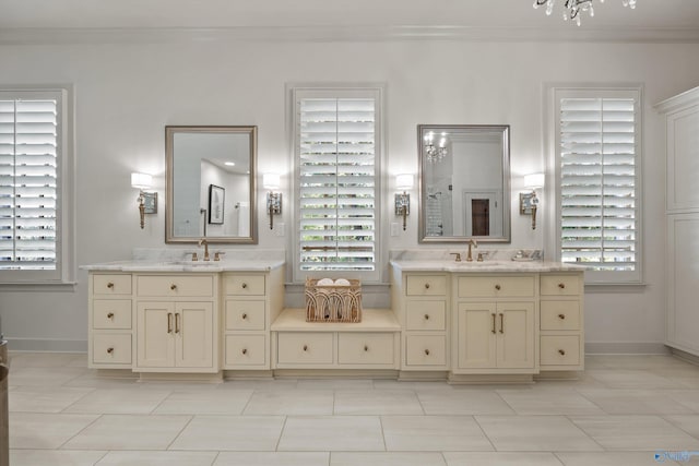 bathroom featuring vanity, ornamental molding, and tile patterned floors