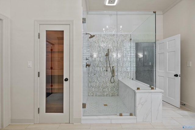 bathroom featuring ornamental molding, a chandelier, an enclosed shower, and tile patterned floors