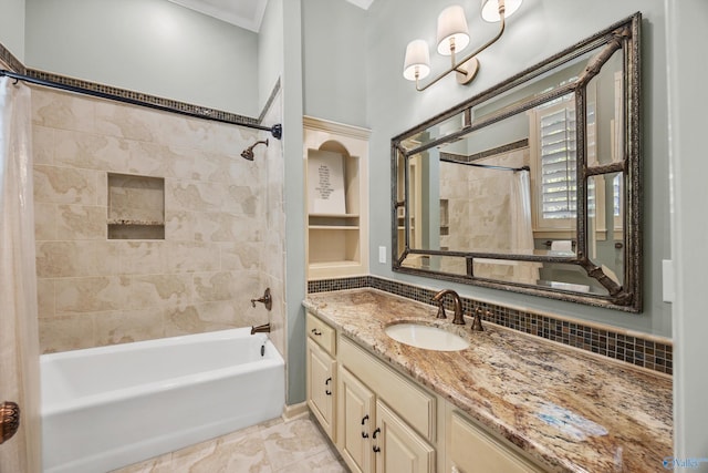 bathroom with shower / bath combination with curtain, vanity, and backsplash