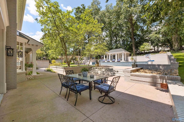 view of patio featuring an outdoor structure