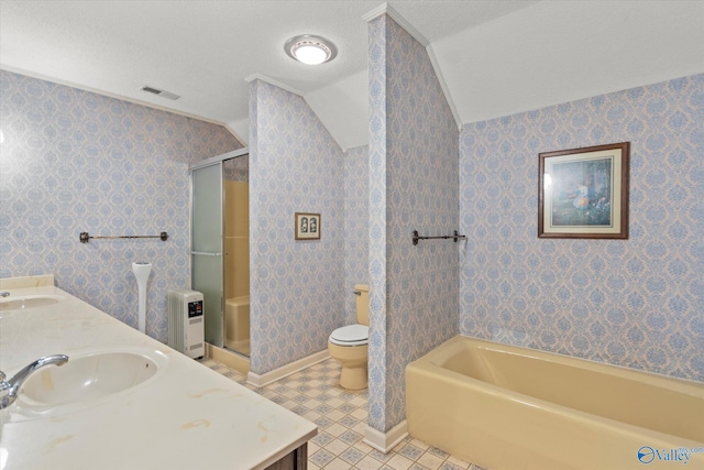 full bathroom featuring toilet, a textured ceiling, vaulted ceiling, and separate shower and tub