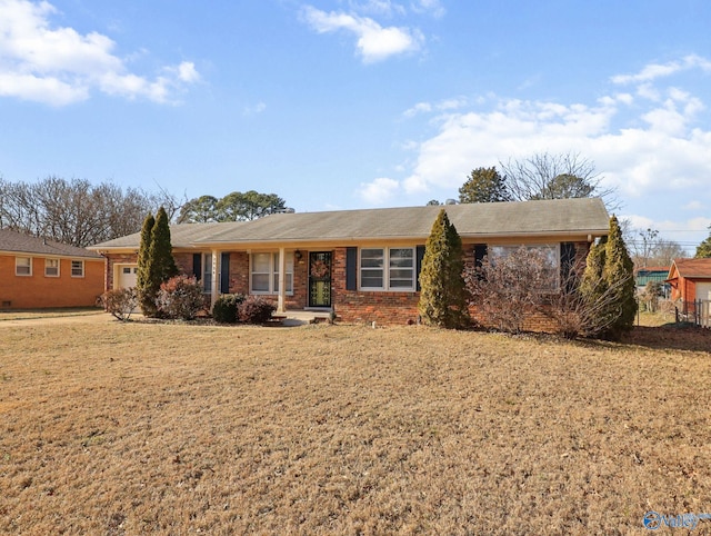 ranch-style house with a front yard