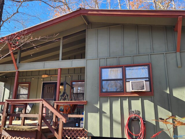 view of exterior entry featuring cooling unit