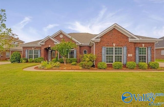 view of front of home with a front yard