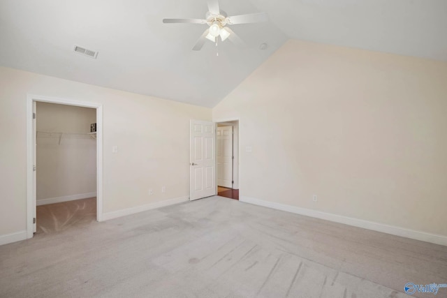 unfurnished bedroom with a ceiling fan, carpet flooring, visible vents, and baseboards