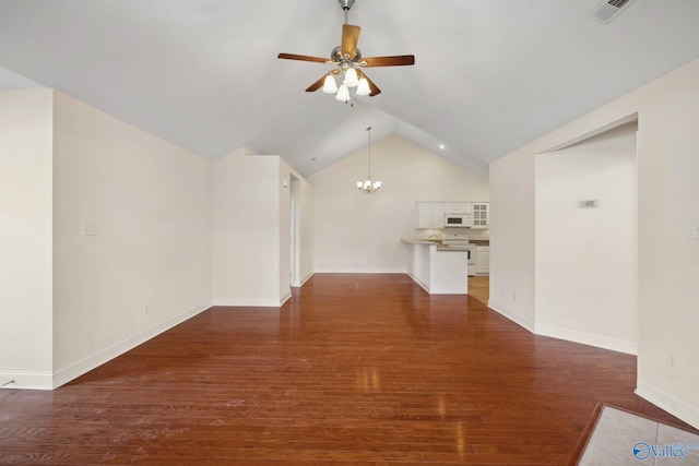 unfurnished living room featuring baseboards, visible vents, wood finished floors, vaulted ceiling, and ceiling fan with notable chandelier