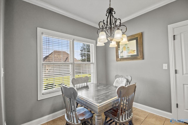22915 Pin Oak Dr, Athens, AL 35613 - dining area with baseboards, a chandelier, crown molding, and light tile patterned flooring