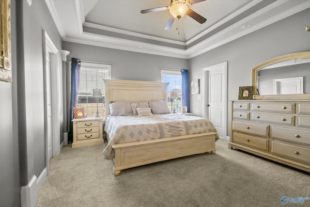 22915 Pin Oak Dr, Athens, AL 35613 - bedroom with a ceiling fan, a raised ceiling, light carpet, and crown molding