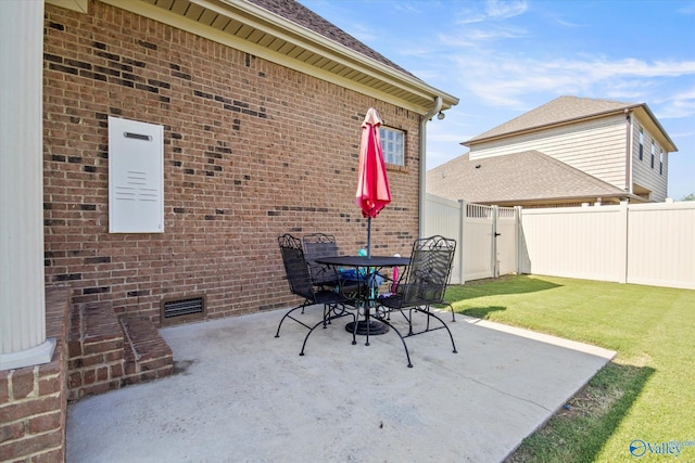 22915 Pin Oak Dr, Athens, AL 35613 - view of patio / terrace featuring outdoor dining area, a fenced backyard, and visible vents