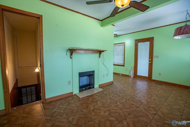 unfurnished living room with ceiling fan, baseboards, a fireplace with raised hearth, and ornamental molding