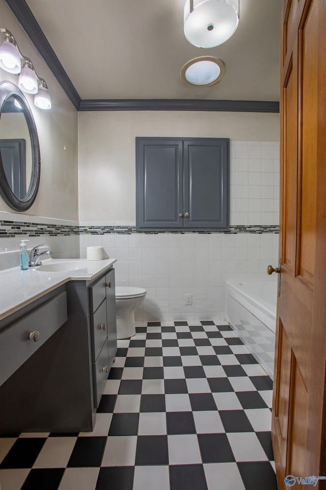 full bathroom with tile patterned floors, tile walls, ornamental molding, and vanity