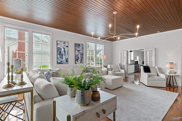 702 5th Ave SE, Cullman, AL 35055 - living area featuring a chandelier, crown molding, wooden ceiling, and wood finished floors