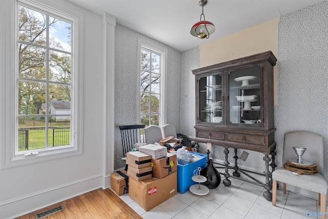 702 5th Ave SE, Cullman, AL 35055 - dining room with visible vents, baseboards, wood finished floors, and wallpapered walls