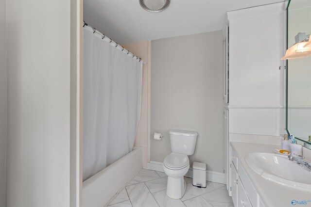 702 5th Ave SE, Cullman, AL 35055 - bathroom featuring visible vents, toilet, shower / bath combo with shower curtain, vanity, and marble finish floor