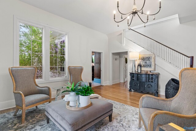 702 5th Ave SE, Cullman, AL 35055 - sitting room featuring a chandelier, wood finished floors, baseboards, and stairway