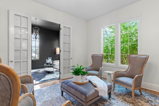 702 5th Ave SE, Cullman, AL 35055 - sitting room featuring french doors, baseboards, and wood finished floors
