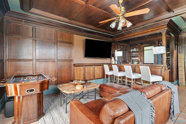 702 5th Ave SE, Cullman, AL 35055 - living area featuring wood walls, a ceiling fan, wooden ceiling, and ornamental molding