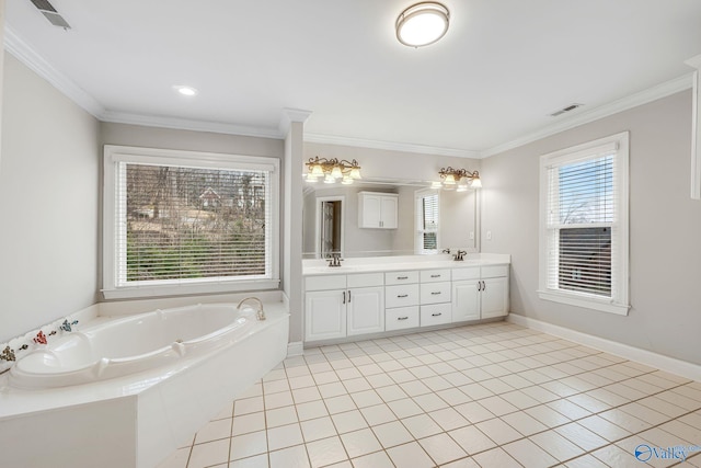 bathroom featuring crown molding, tile patterned floors, and vanity