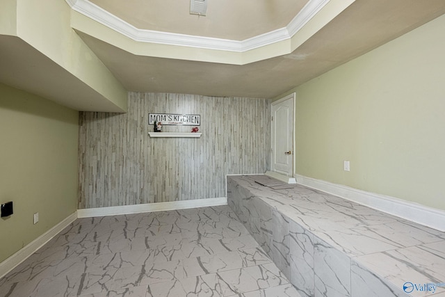 interior space with crown molding