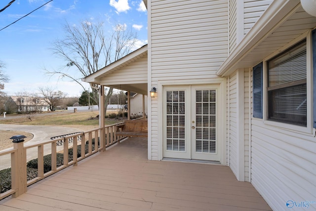 wooden terrace featuring french doors