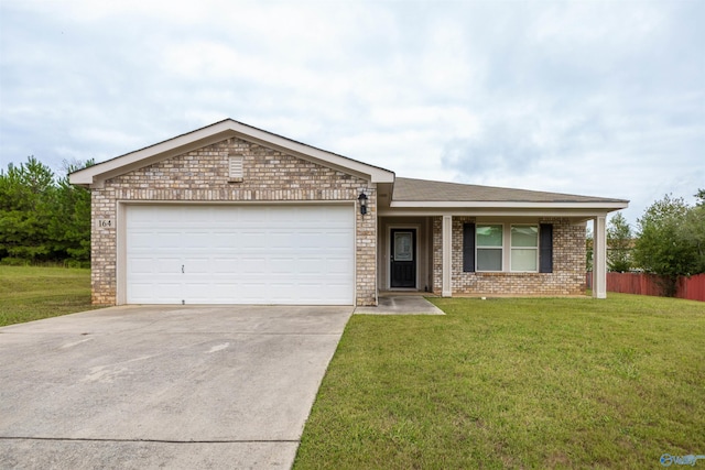 ranch-style home with a front lawn and a garage