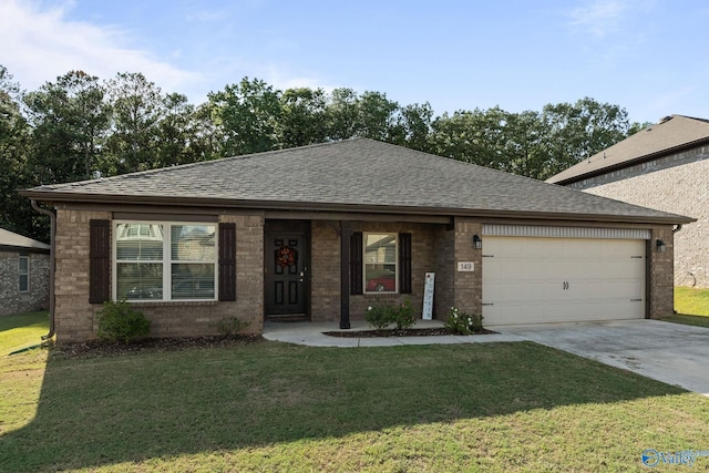 view of front of house featuring a garage and a front yard