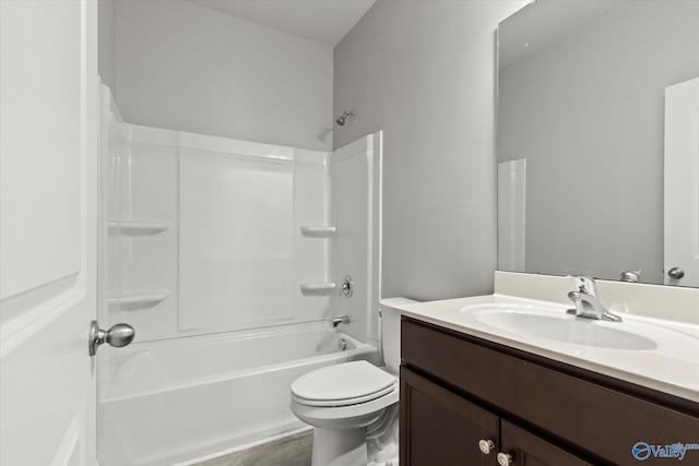 full bathroom featuring vanity, tile patterned flooring,  shower combination, and toilet