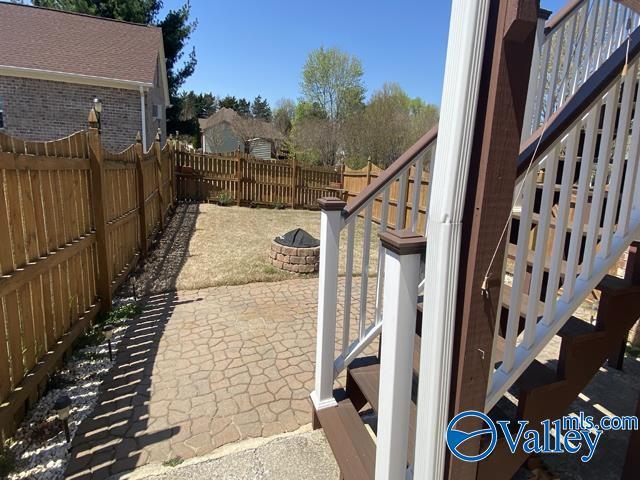 view of patio featuring a fire pit