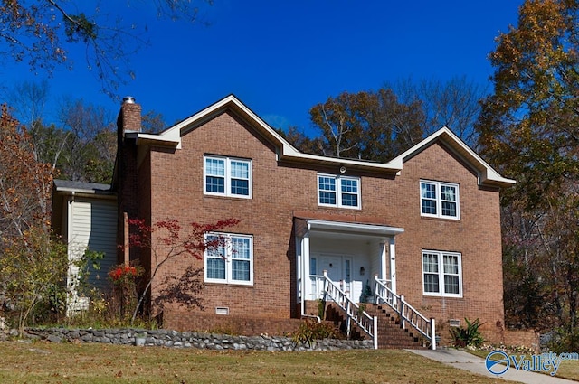 view of front of house with a front yard