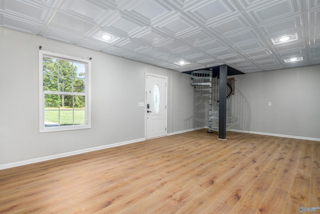 basement with light wood-type flooring