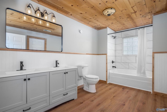 full bathroom featuring wooden ceiling, wood-type flooring, toilet, shower / bath combo with shower curtain, and vanity