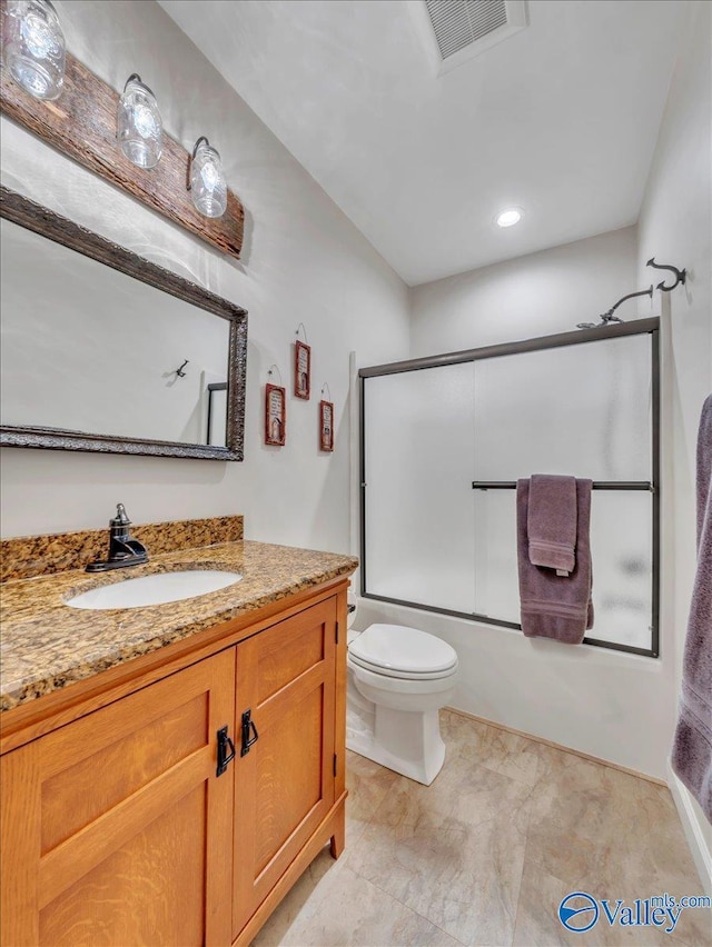 591 Nix Rd, Hazel Green, AL 35750 - bathroom featuring toilet, vanity, enclosed tub / shower combo, and recessed lighting