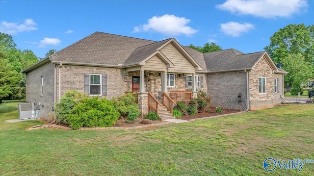 591 Nix Rd, Hazel Green, AL 35750 - craftsman-style house featuring a front lawn, brick siding, and a porch