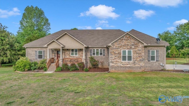 591 Nix Rd, Hazel Green, AL 35750 - craftsman-style house with a front yard, stone siding, and brick siding