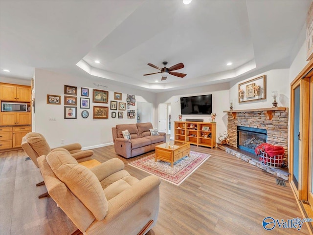 591 Nix Rd, Hazel Green, AL 35750 - living area with a raised ceiling, light wood-style flooring, and recessed lighting