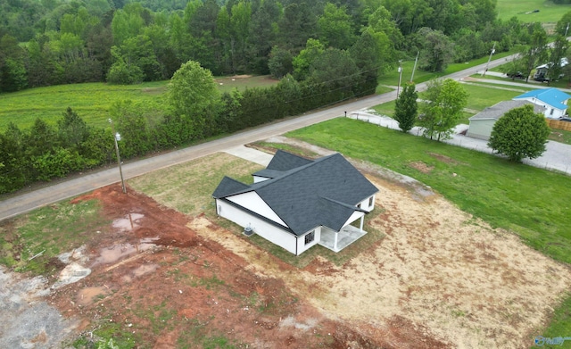 bird's eye view with a view of trees