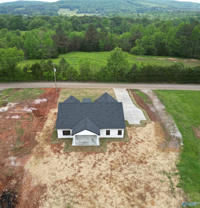 bird's eye view with a forest view